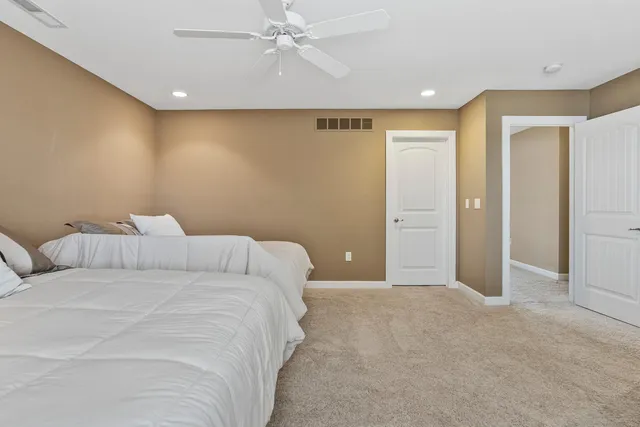 a bathroom with a sink double vanity and a mirror