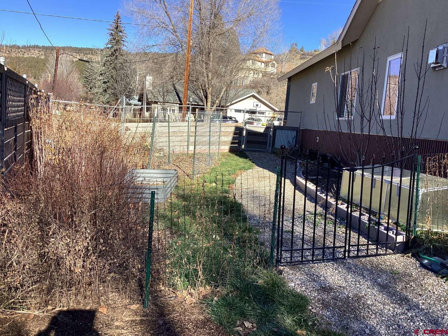 416 West 28th Street Durango, CO 81301 - Photo 15 of 16 a view of a house with a yard