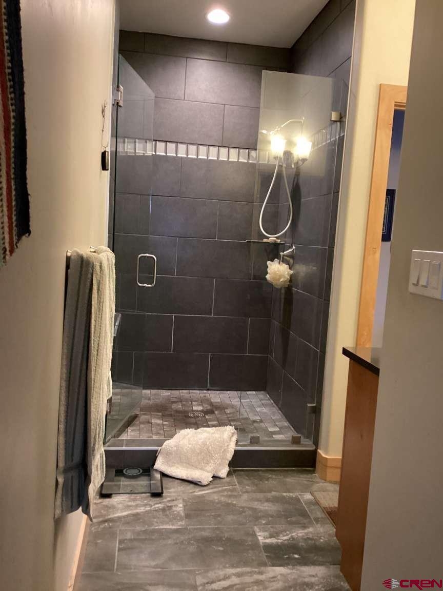 416 West 28th Street Durango, CO 81301 - Photo 7 of 16 a bathroom with a shower