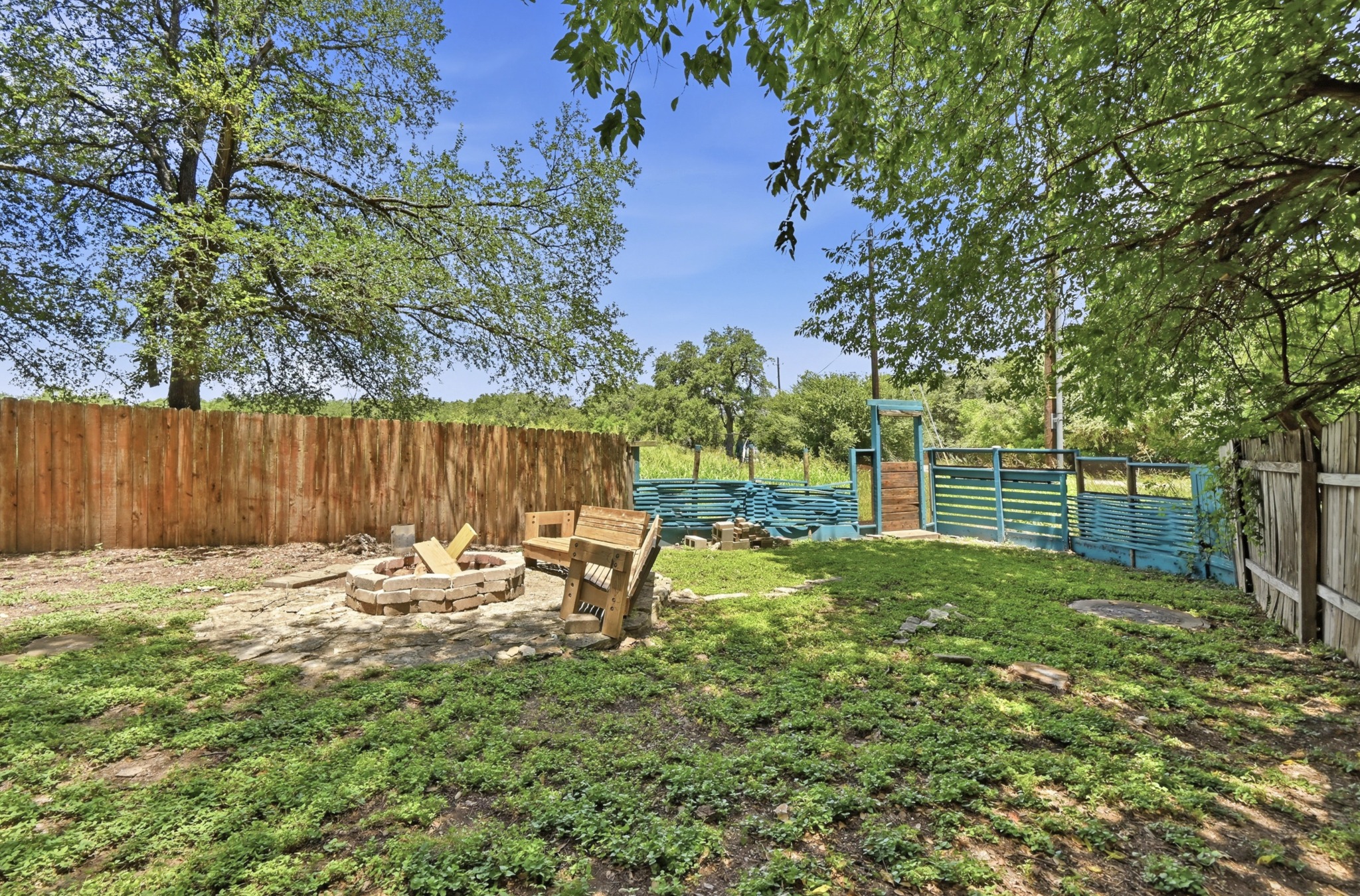 708 Shade Tree Drive Austin, TX 78748 - Photo 29 of 32 Privacy fencing runs along the sides of the yard while the back of the yard comes with two gates, one for bringing a boat or car, and another for stepping out to the greenbelt.