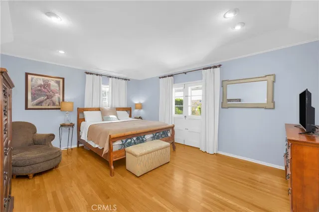 a view of balcony with two chairs and a potted plant
