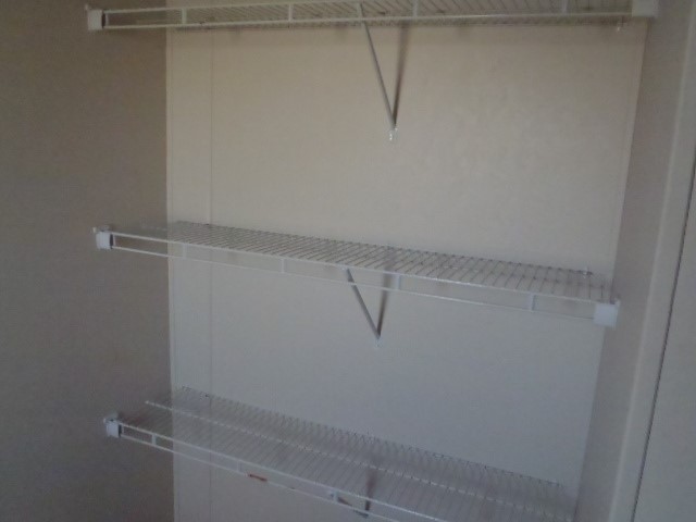 964 Railyard Drive Kyle, TX 78640 - Photo 17 of 25 View of Linen shelves