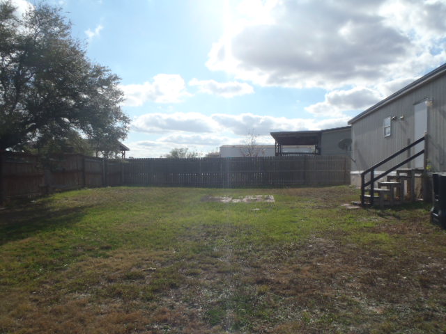 964 Railyard Drive Kyle, TX 78640 - Photo 6 of 25 View of fenced backyard