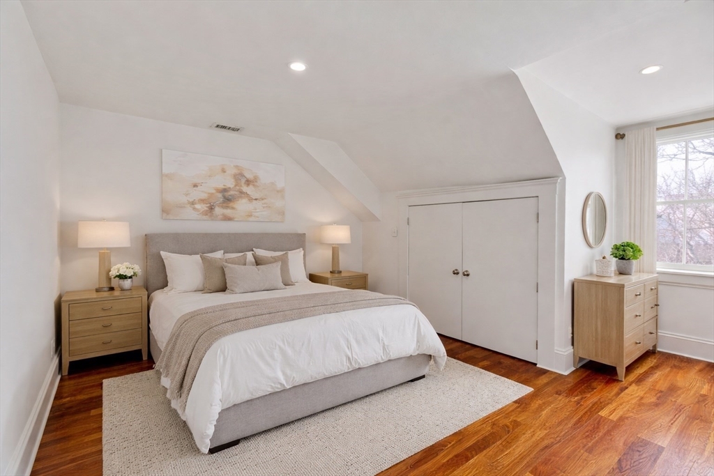 65 Rutland Street, Unit 3 Boston, MA 02118 - Photo 7 of 25 a bedroom with a bed and a dresser