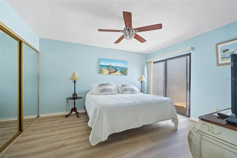 a view of a lake with a table and a chair