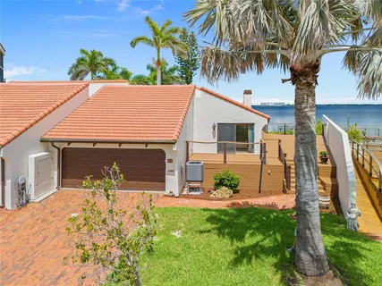 a view of a lake with a large building