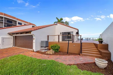 outdoor view of a swimming pool with outdoor seating