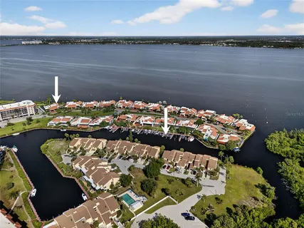 a view of a garden with flowers and trees