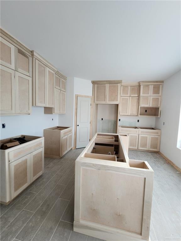 301 North 31st Street Hidalgo, TX 78557 - Photo 4 of 11 a room with furniture a washer and dryer