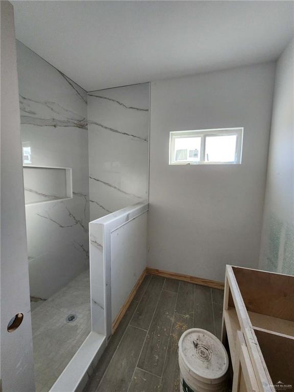 301 North 31st Street Hidalgo, TX 78557 - Photo 8 of 11 a bathroom with a toilet and a shower