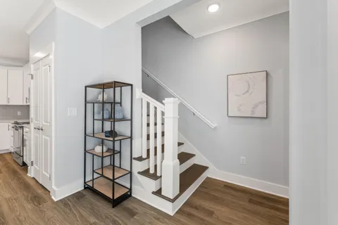 a view of entryway with wooden floor