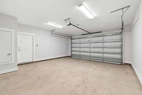 a view of room that has a white walls