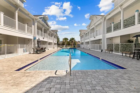 a view of a building with swimming pool