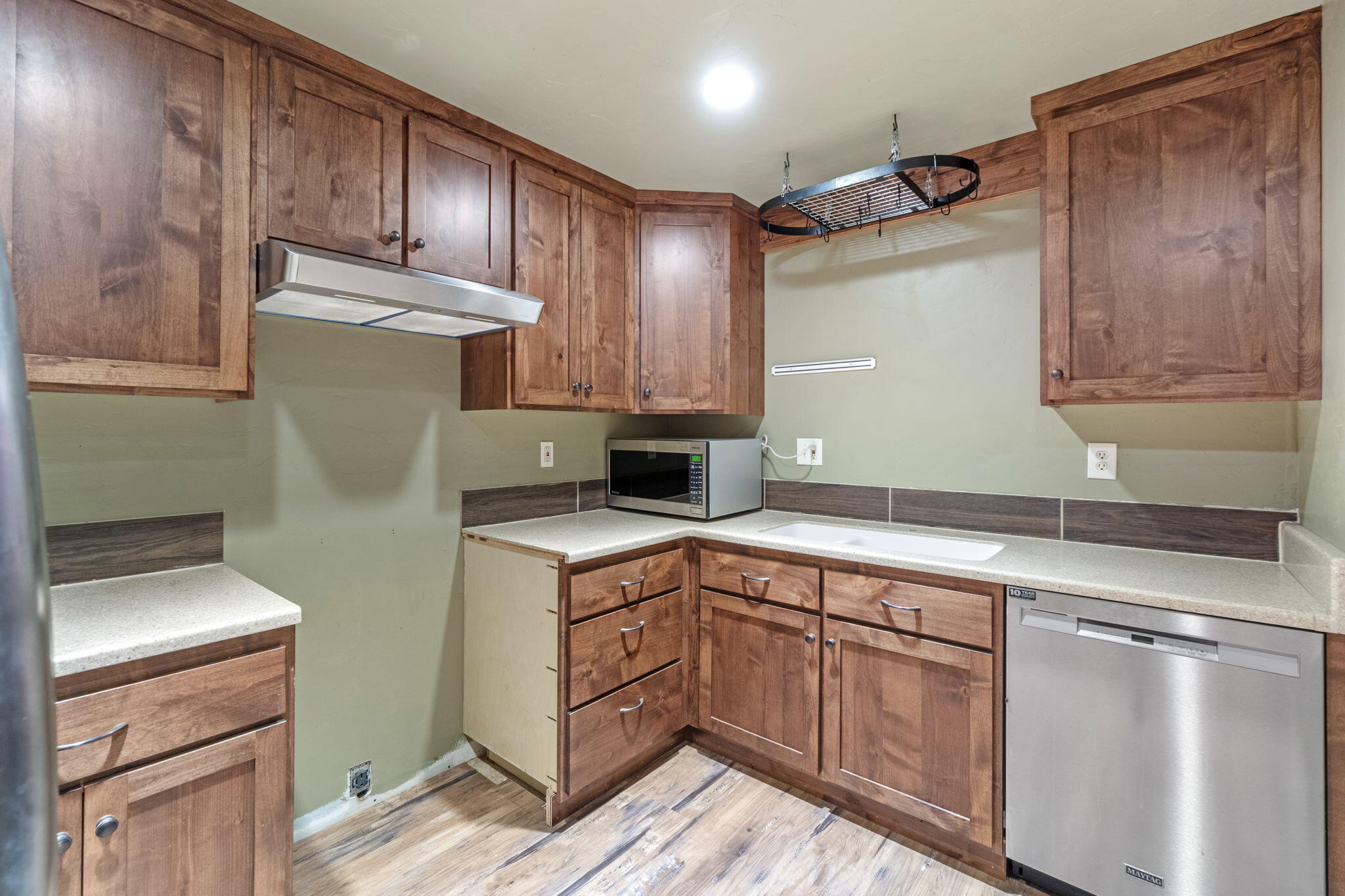 2630 Frontage Road Klamath Falls, OR 97601 - Photo 68 of 72 a kitchen with a sink stove and cabinets