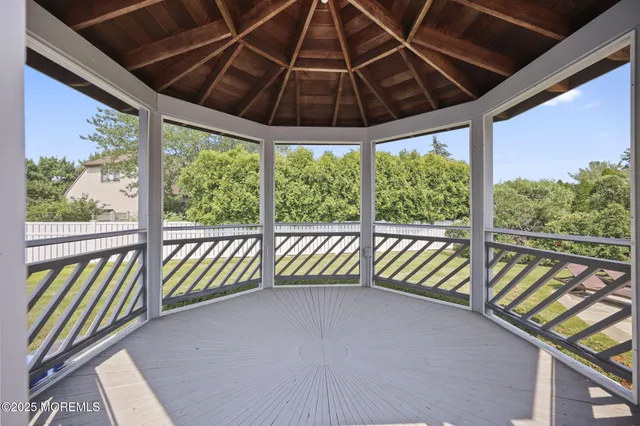 a view of balcony with a potted plant