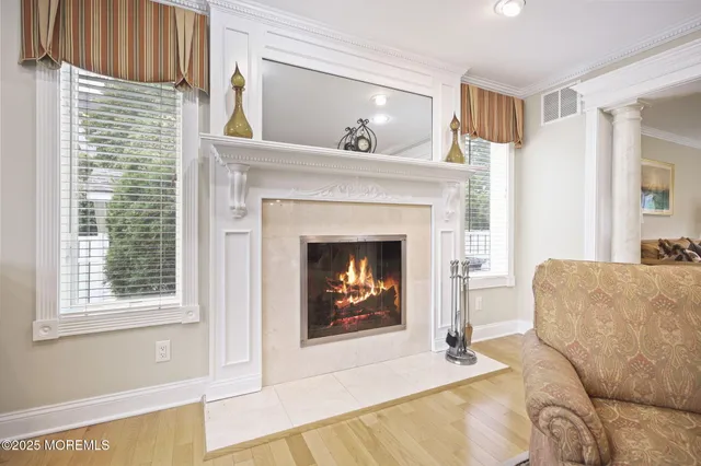 a kitchen with granite countertop a stove sink and cabinets