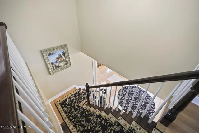 a view of walk in closet with clothes