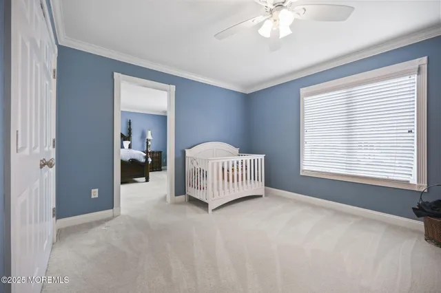 a room with gym equipment and windows