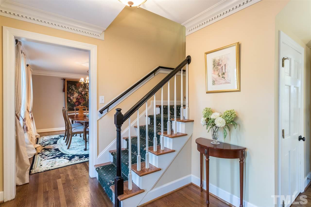 7728 Rainwater Road Raleigh, NC 27615 - Photo 14 of 30 Hardwood stair treads with runner