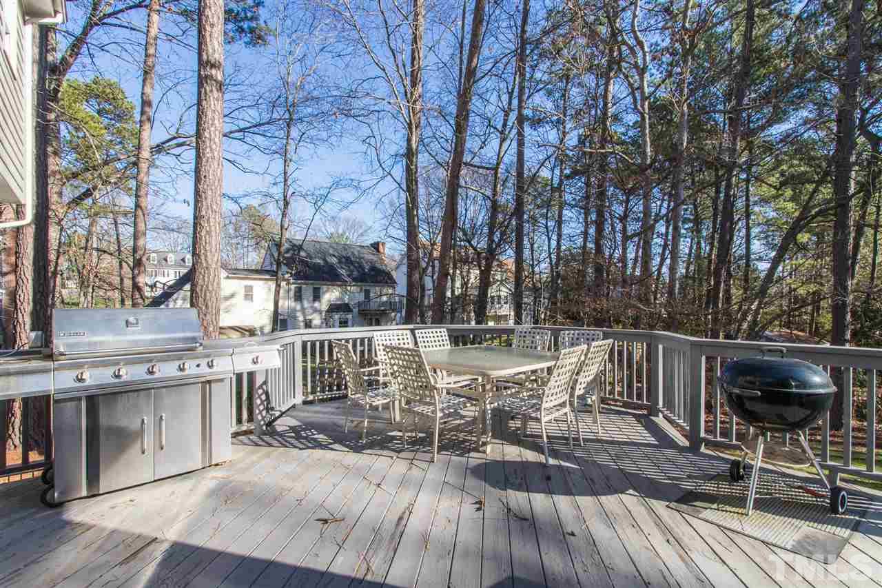 7728 Rainwater Road Raleigh, NC 27615 - Photo 27 of 30 Deck adjoins the 3 Seasons Room.