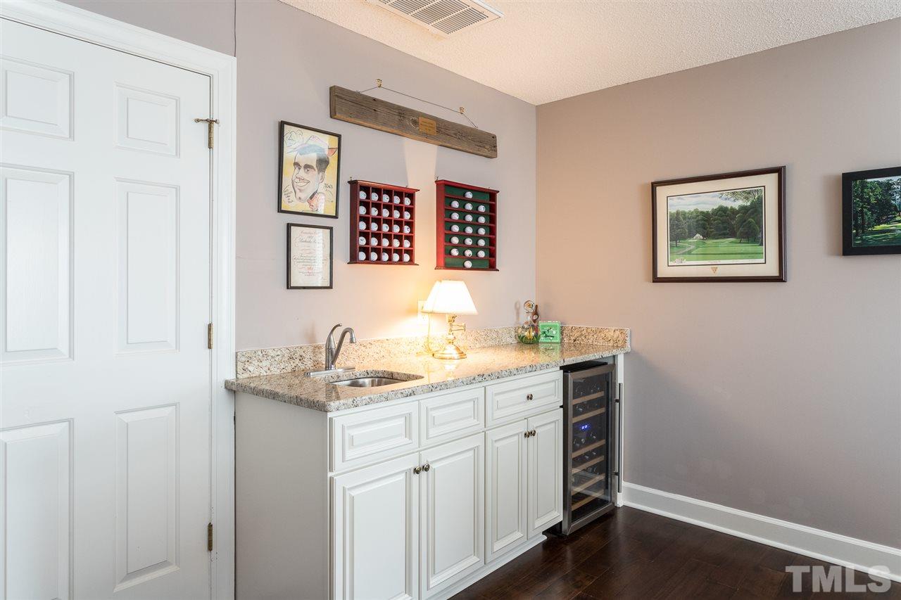 7728 Rainwater Road Raleigh, NC 27615 - Photo 28 of 30 Granite countertop and bar sink.