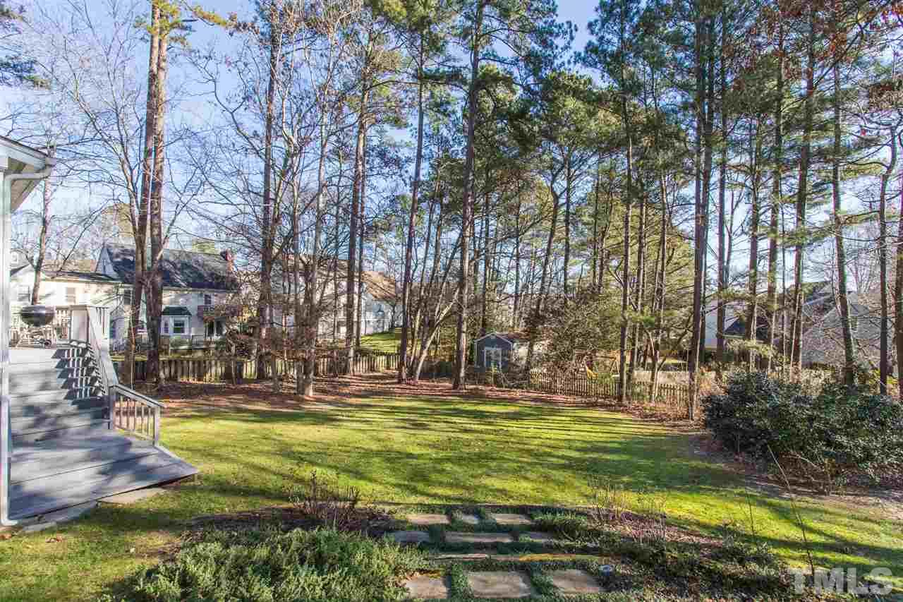 7728 Rainwater Road Raleigh, NC 27615 - Photo 29 of 30 Fully fenced backyard. Perfect for fun and games!