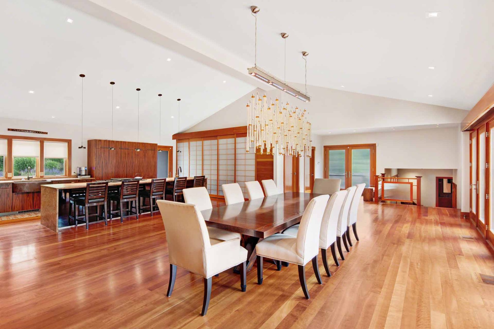 400 Barnes Road Oak Bluffs, MA 02568 - Photo 11 of 45 a dining room with furniture window and wooden floor