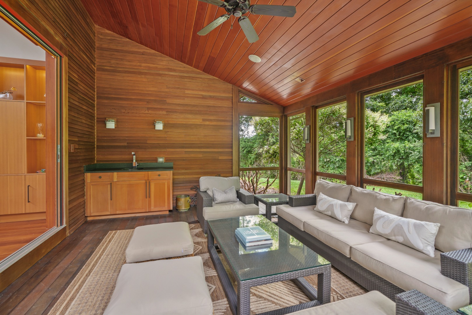 400 Barnes Road Oak Bluffs, MA 02568 - Photo 13 of 45 a living room with furniture and a large window