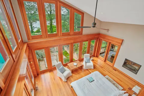 a very nice looking living room with a large window