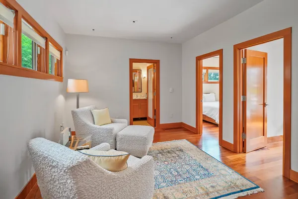 a living room with furniture and a rug