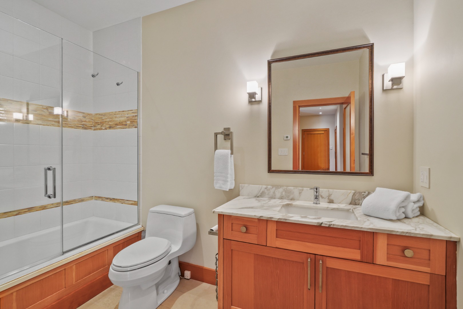 400 Barnes Road Oak Bluffs, MA 02568 - Photo 32 of 45 a bathroom with a granite countertop sink a toilet and shower