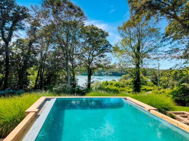 a view of swimming pool from a balcony