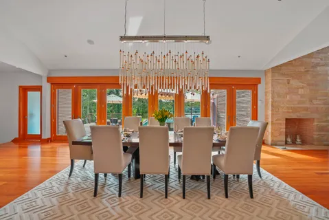 a view of a dining room with furniture window and outside view
