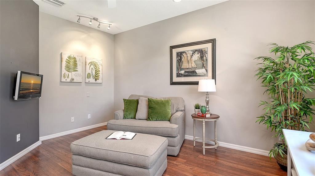 664 Crane Prairie Way Osprey, FL 34229 - Photo 24 of 69 a living room with furniture and a potted plant