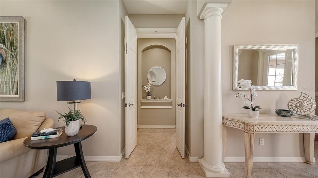 664 Crane Prairie Way Osprey, FL 34229 - Photo 29 of 69 a living room with furniture and a window