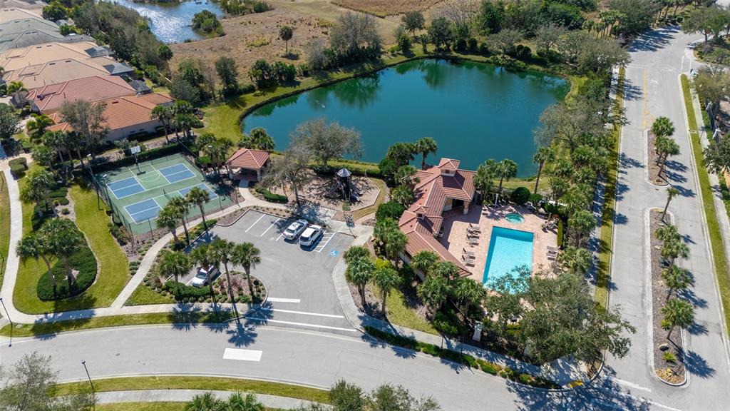 664 Crane Prairie Way Osprey, FL 34229 - Photo 59 of 69 an aerial view of lake residential house with outdoor space and swimming pool