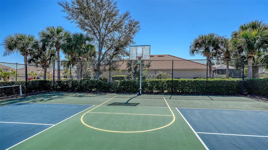 664 Crane Prairie Way Osprey, FL 34229 - Photo 65 of 69 a swimming pool with outdoor seating and yard