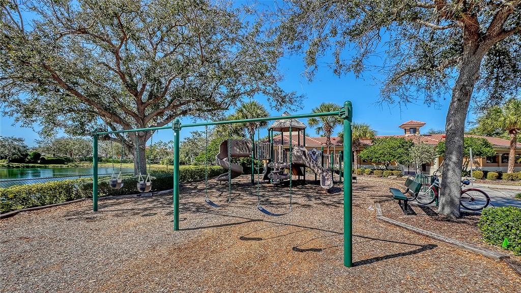 664 Crane Prairie Way Osprey, FL 34229 - Photo 67 of 69 a view of a park with iron fence