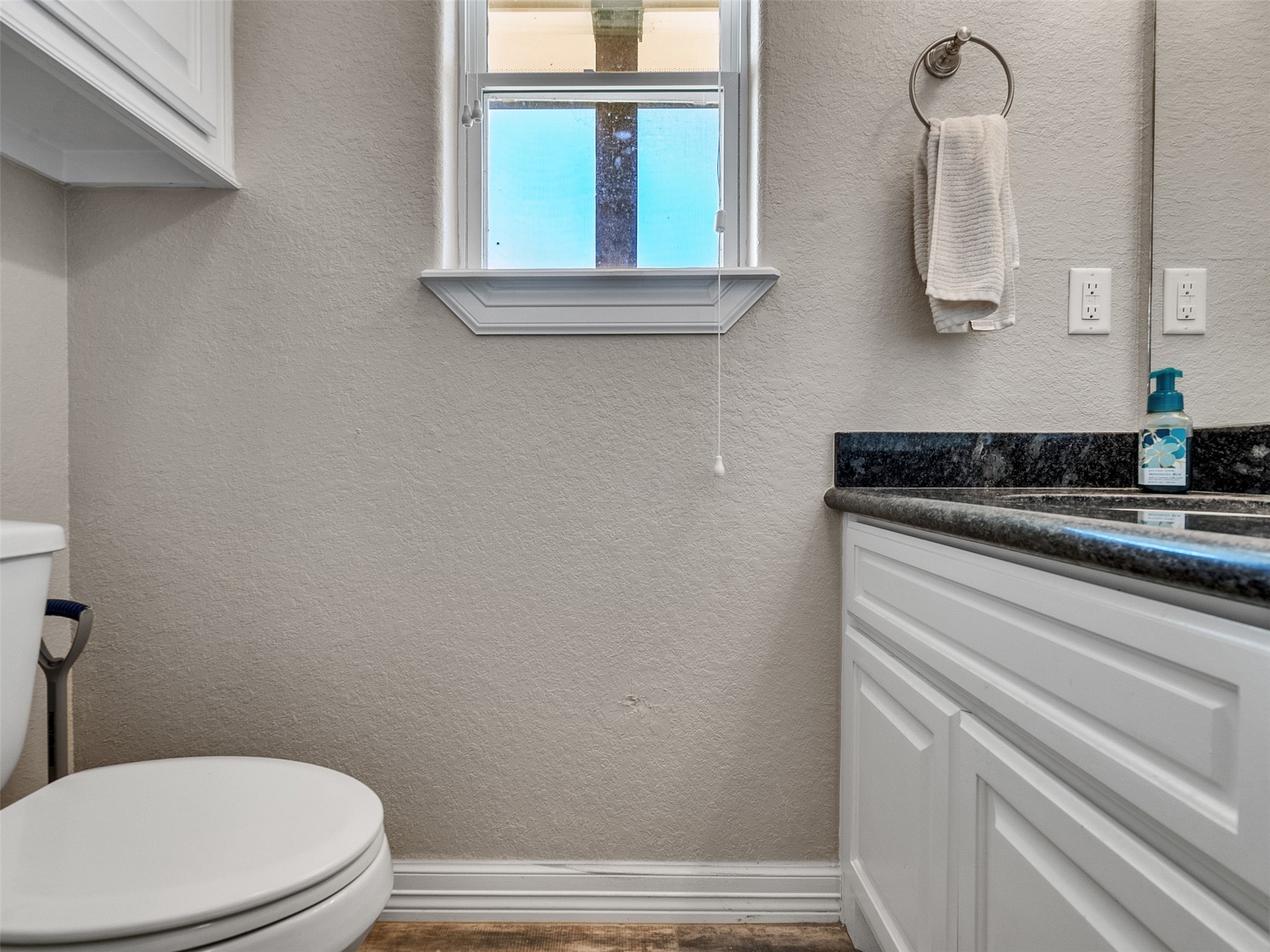 155 Horse Shoe Trail Angleton, TX 77515 - Photo 17 of 29 a bathroom with a toilet sink and mirror