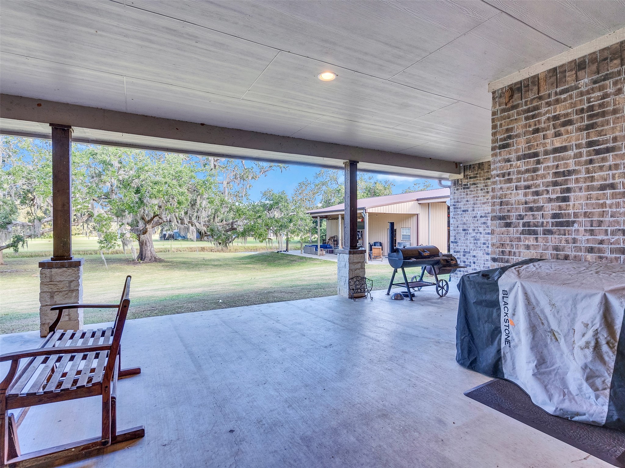 155 Horse Shoe Trail Angleton, TX 77515 - Photo 18 of 29 a living room with furniture and a large window
