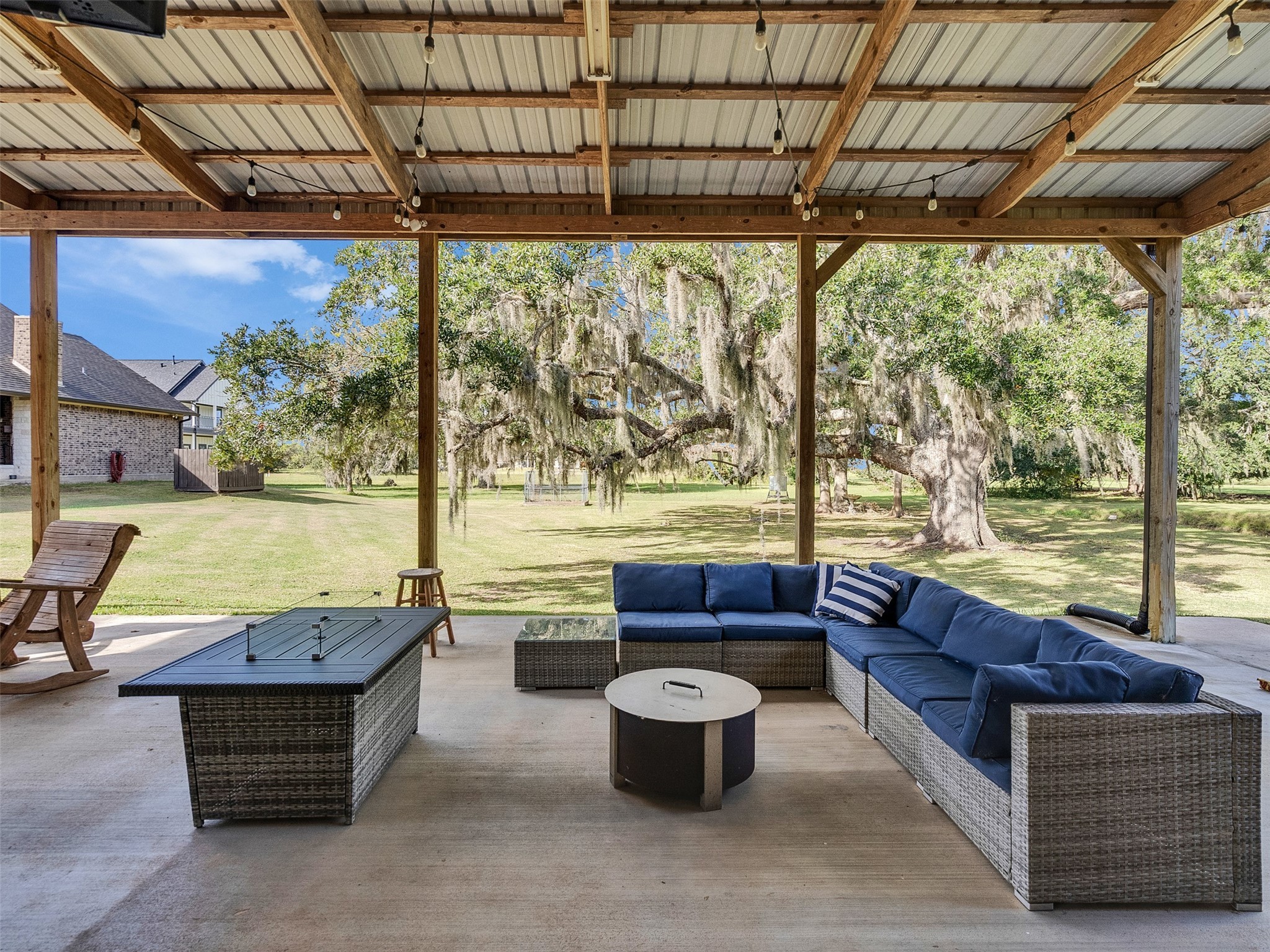 155 Horse Shoe Trail Angleton, TX 77515 - Photo 21 of 29 a living room with a large window and a table