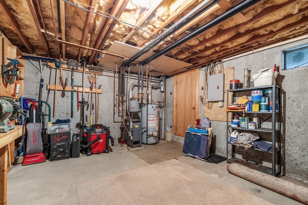 38 High Street, Unit 8 Hanson, MA 02341 - Photo 26 of 37 a view of storage and utility room