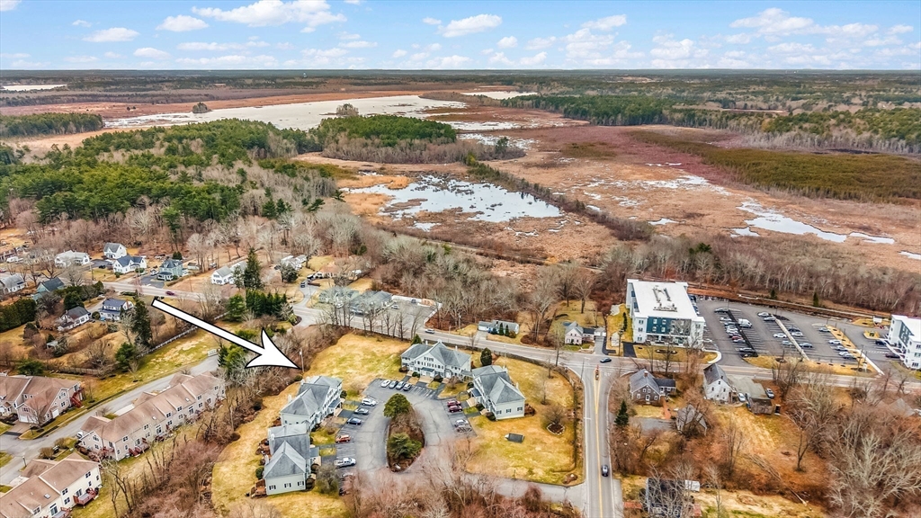 38 High Street, Unit 8 Hanson, MA 02341 - Photo 34 of 37 a view of an ocean and beach