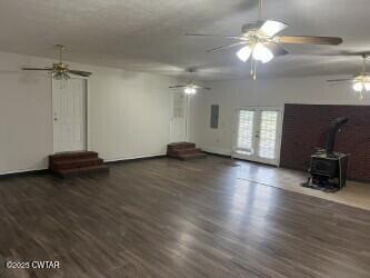 300 Archibald Road Stanton, TN 38069 - Photo 11 of 22 an empty room with wooden floor and windows