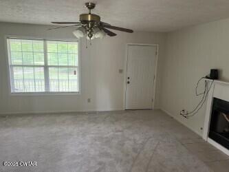 300 Archibald Road Stanton, TN 38069 - Photo 15 of 22 a view of empty room with ceiling fan