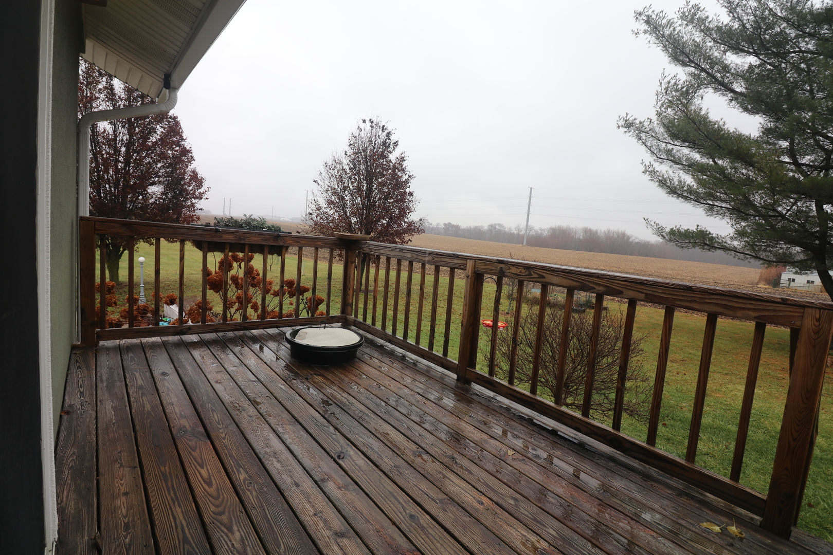 8843 Sunset Road Clinton, IL 61727 - Photo 4 of 32 a view of balcony with wooden floor