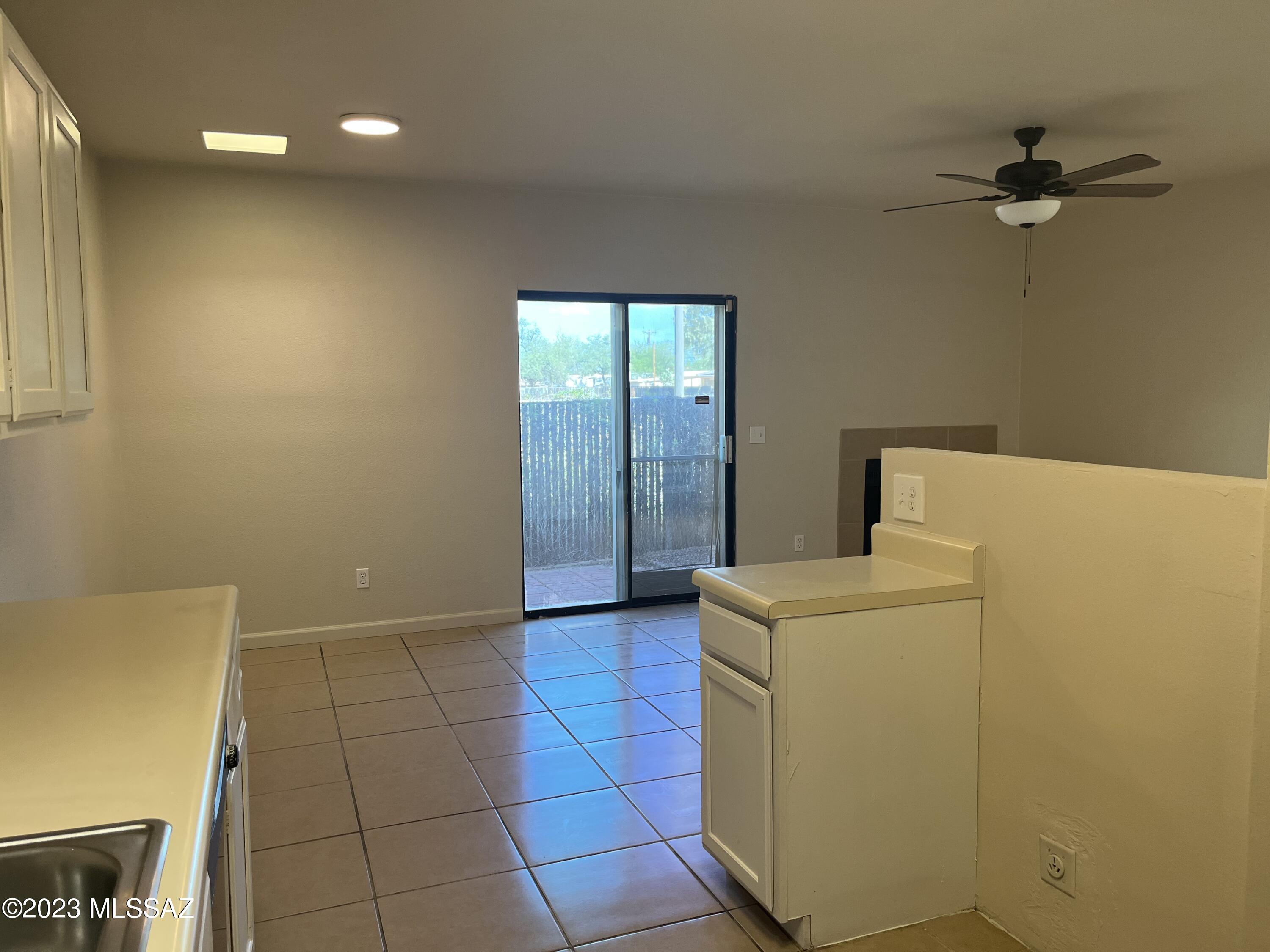 308 West King Road Tucson, AZ 85705 - Photo 12 of 20 a view of storage and utility room with washer and dryer