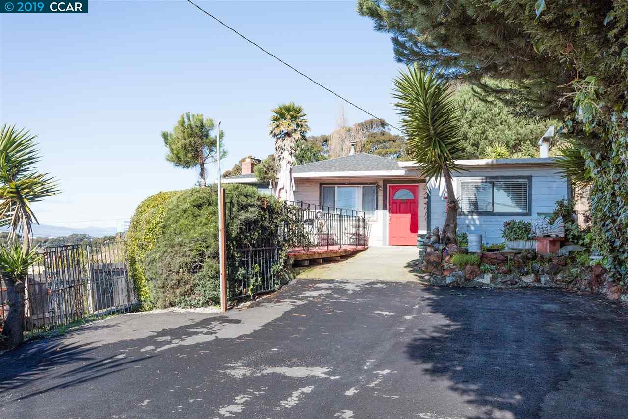 5457 Alpine Road San Pablo, CA 94806 - Photo 1 of 1 a view of a house with a backyard and garden