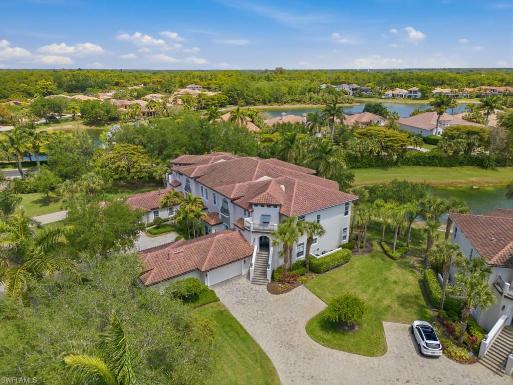 28511 Calabria Court, Unit 202 Naples, FL 34110 - Photo 25 of 44 an aerial view of a house with lake view