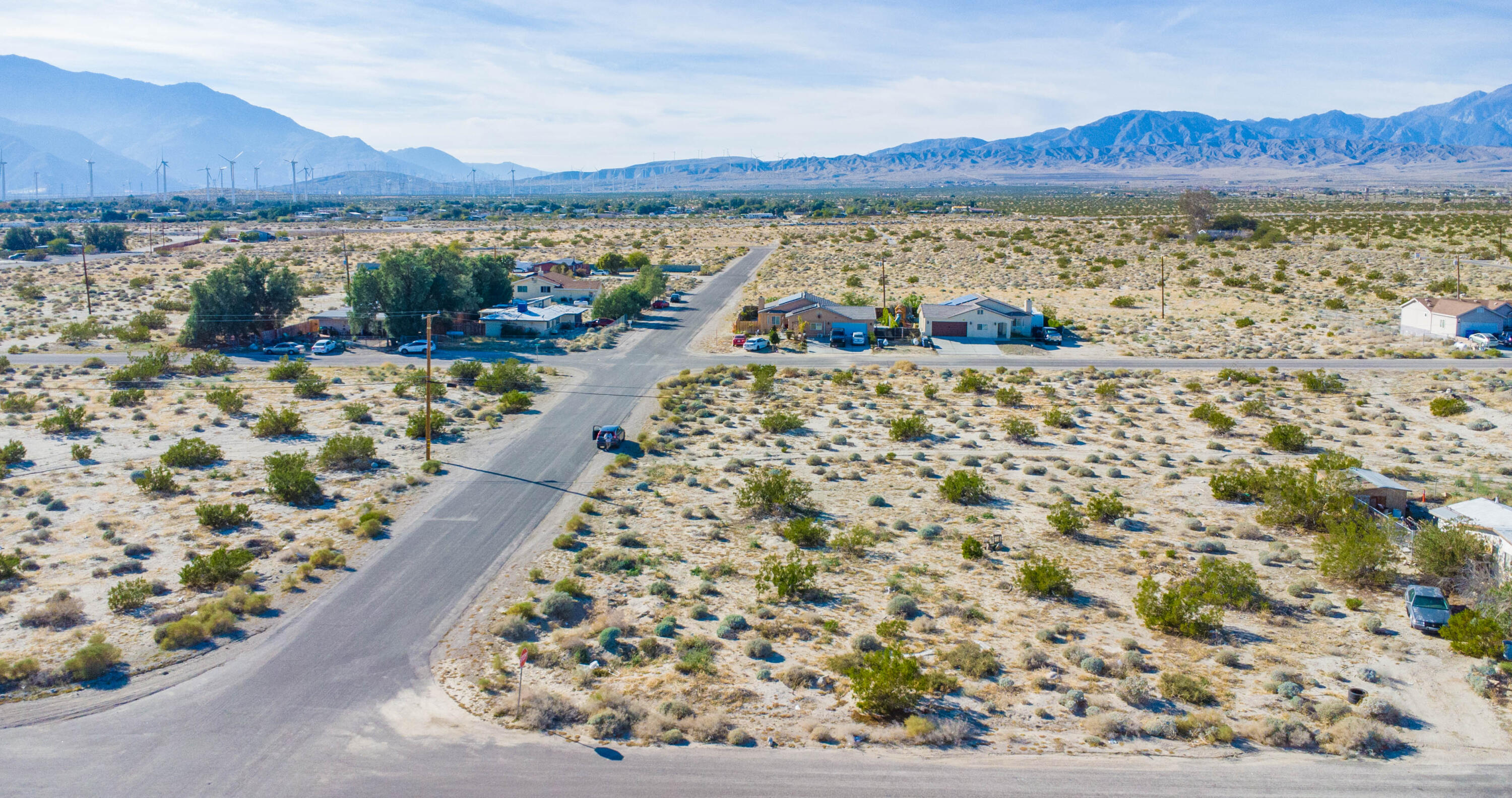 0 Tram View Road Desert Hot Springs, CA 92240 - Photo 4 of 9 a view of a lake with a mountain